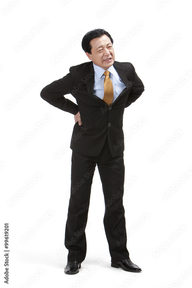 Senior businessman suffering from low back pain Senior businessman suffering from low back pain