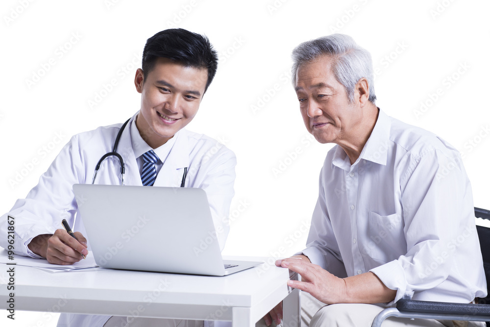 Doctor and patient seeing the results on laptop Doctor and patient seeing the results on laptop