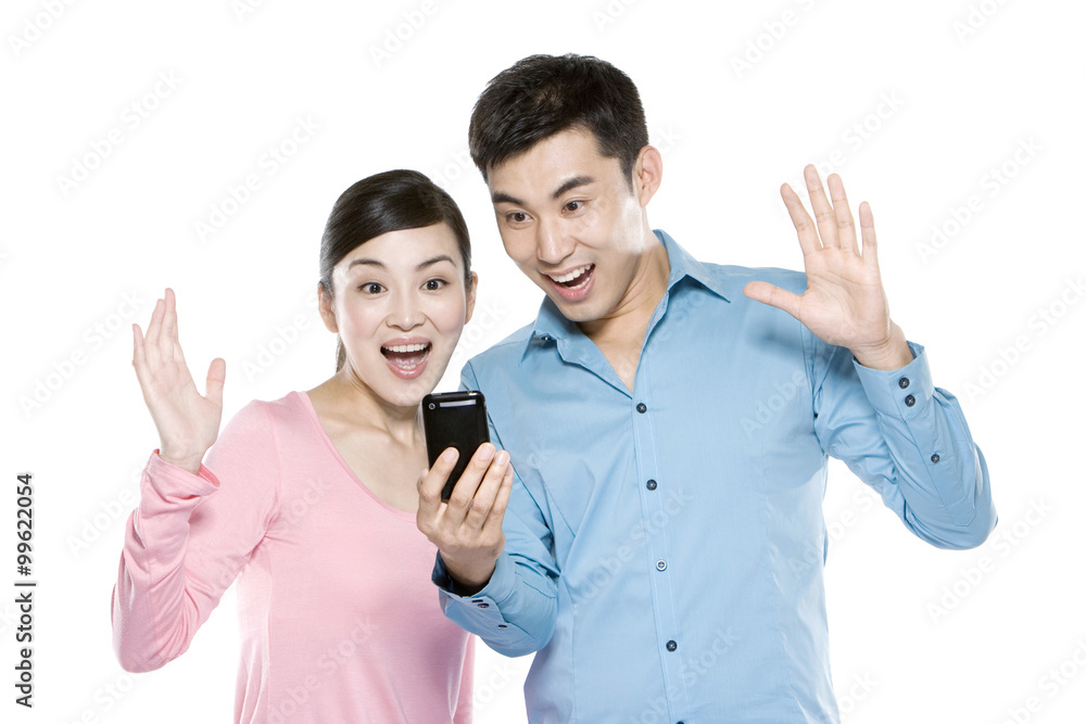 Couple Looking At Phone Couple Looking At Phone