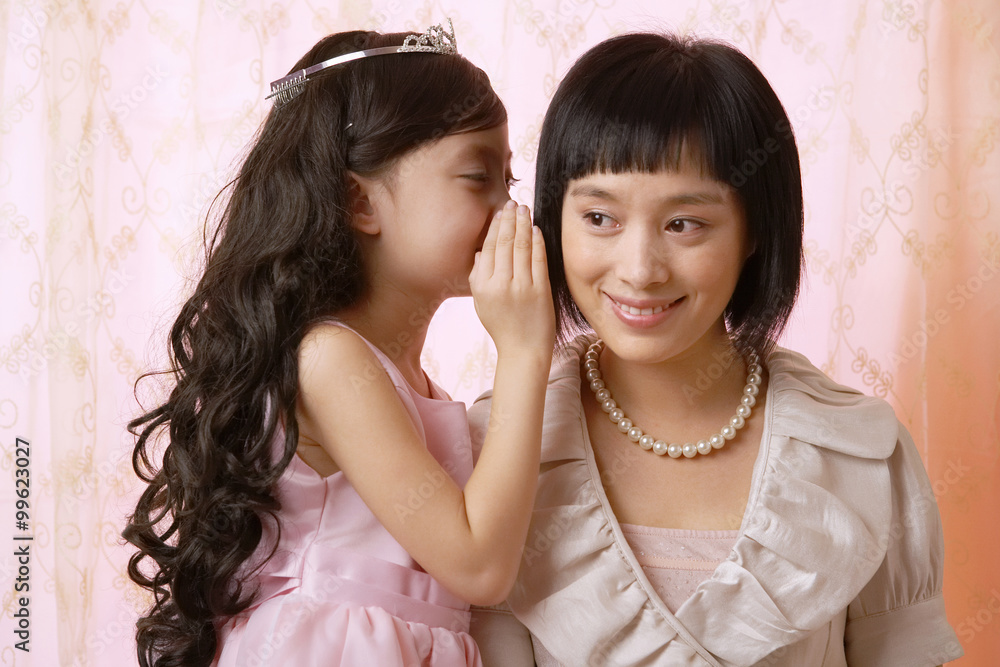 Mother And Daughter Sharing A Secret Mother And Daughter Sharing A Secret