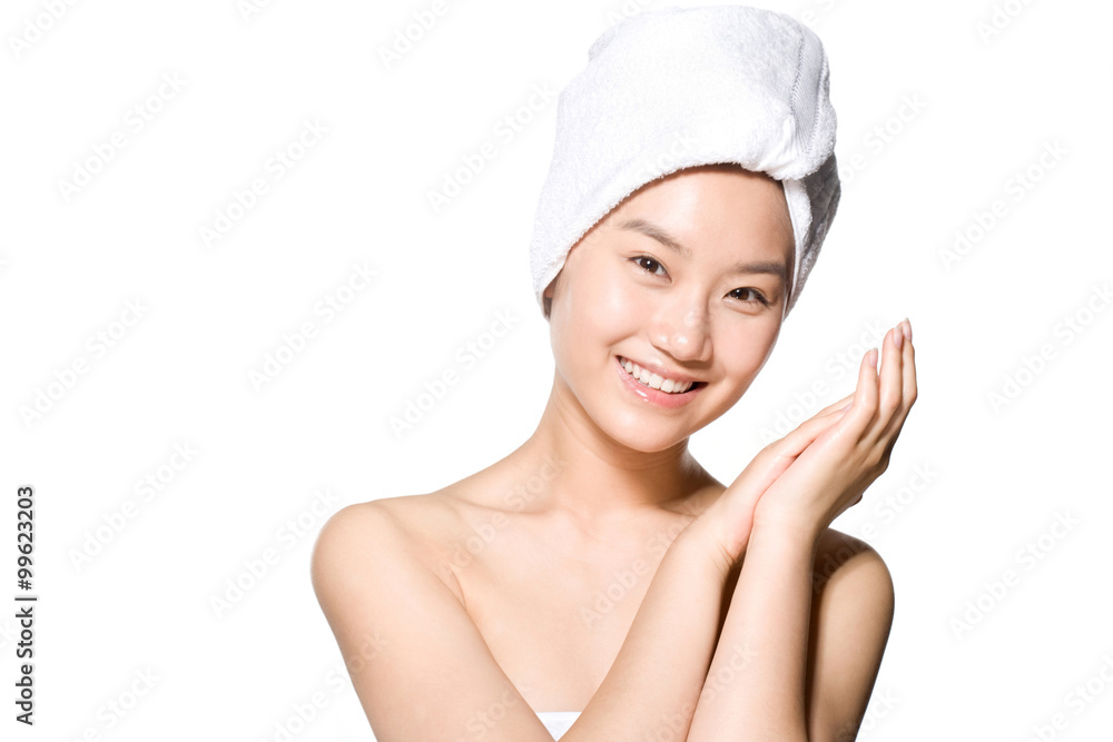 Beauty shot of a young woman in a towel Beauty shot of a young woman in a towel
