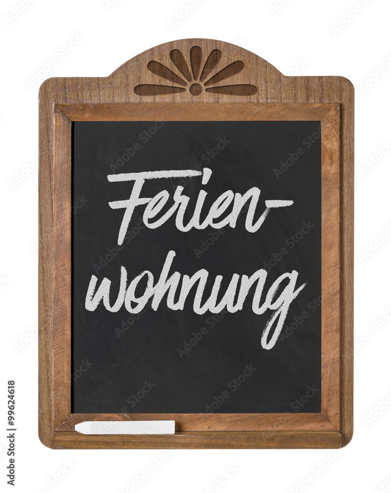 Kreidetafel mit der Beschriftung Ferienwohnung Kreidetafel mit der Beschriftung Ferienwohnung