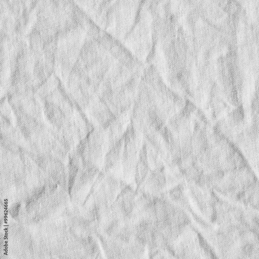 White canvas with delicate striped pattern, crumpled. White canvas with delicate striped pattern, crumpled.