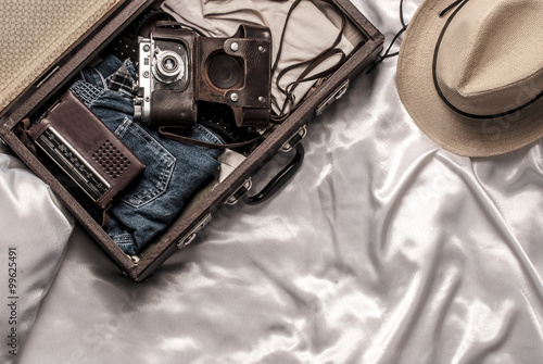 Traveler's suitcase with vintage items © Vasilev Evgenii