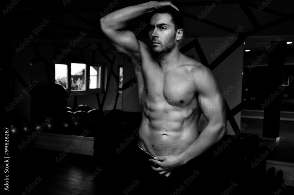 Sexy, attractive muscular man black and white