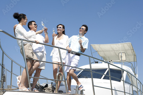 Friends Drinking Champagne on a Yacht