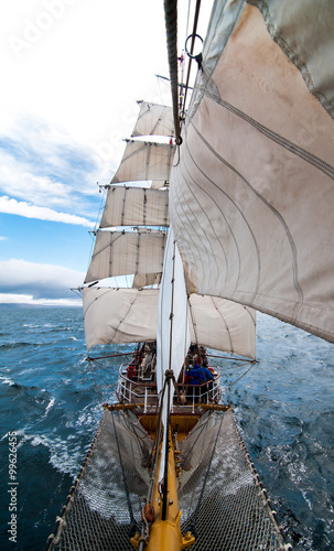 under full sail in the open ocean