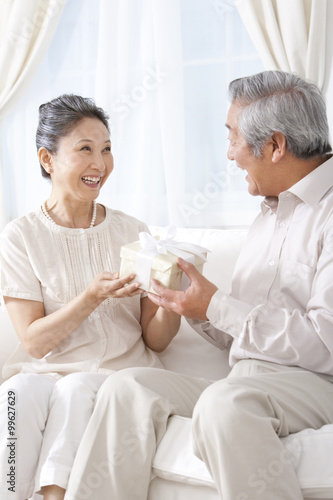 Couple exchanging presents