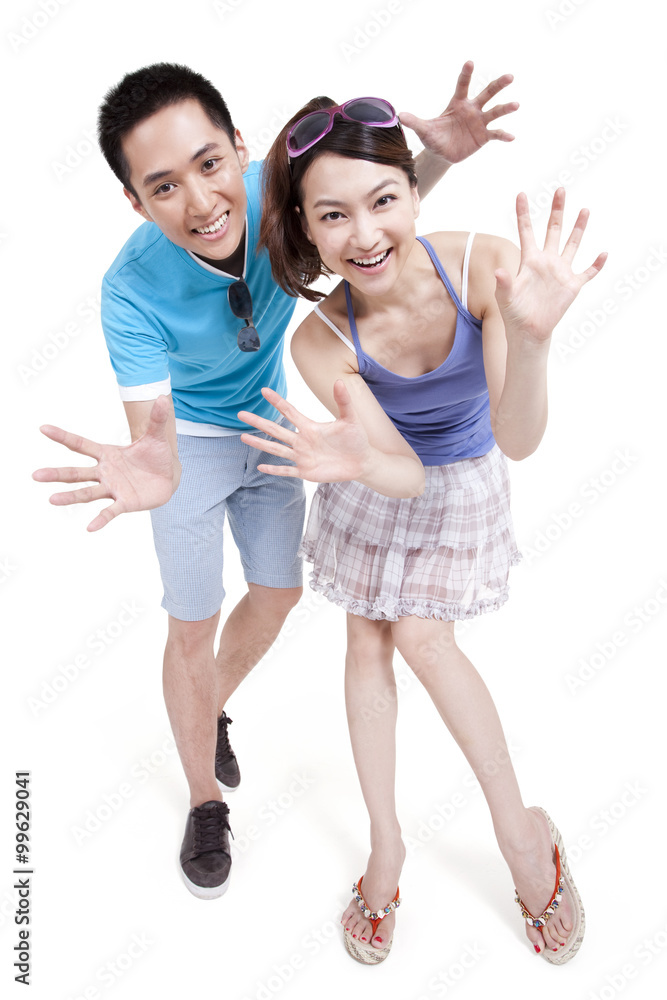 Cheerful young couple gesturing Cheerful young couple gesturing