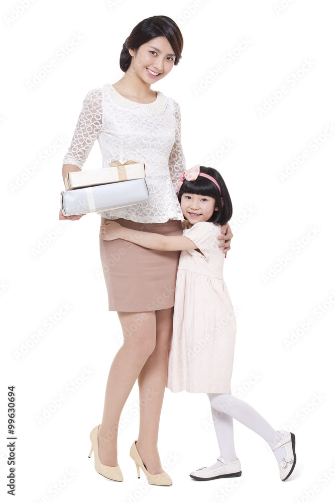 Fototapeta premium Happy mother and daughter with gift box