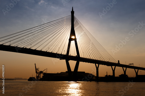 Silhouette Of Bridge At Twilight Time