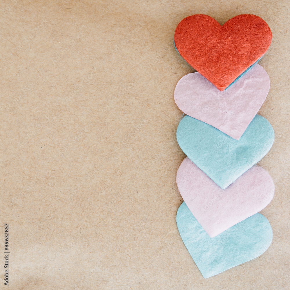 Fototapeta premium Valentines day background with red hearts over texture paper bac