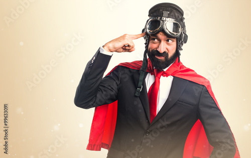 Canvas Print Super hero businessman making crazy gesture