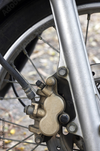 detail of motorcycle disc brakes, close up image