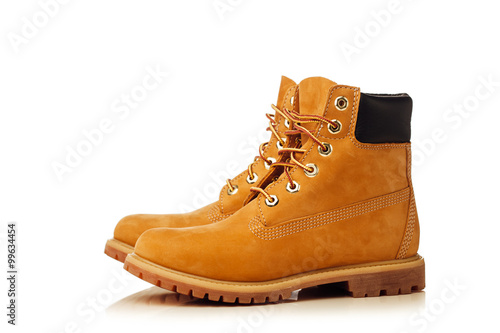 yellow winter boots isolated on white