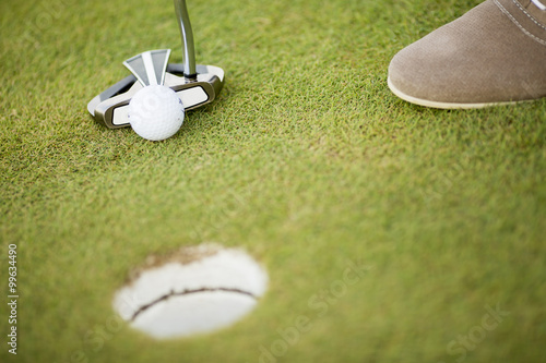 Golf ball, putter and boy's...