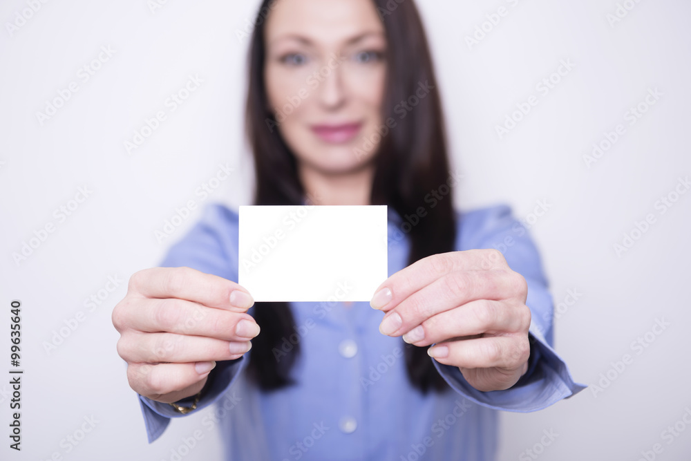 beautiful brunette business woman in working attire posing on grey background beautiful brunette business woman in working attire posing on grey background