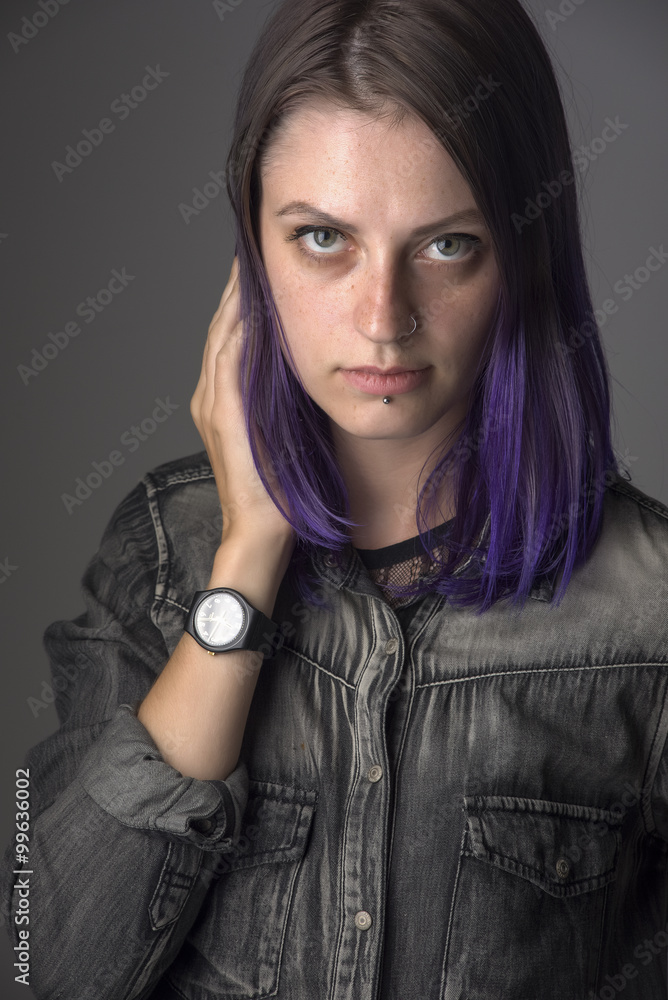 Violet haired gothic girl posing in studio Violet haired gothic girl posing in studio