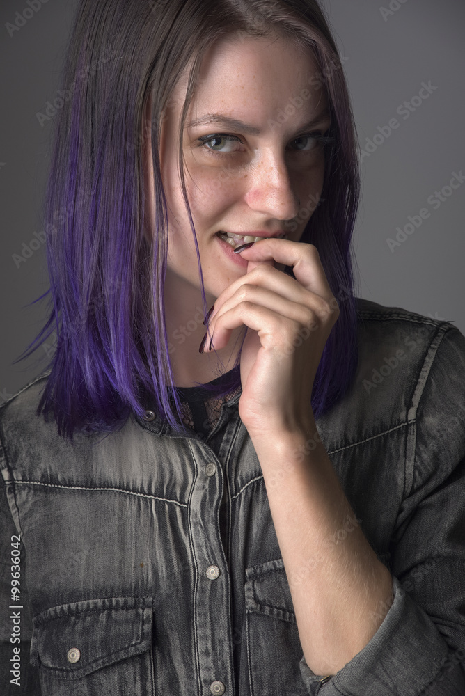 Violet haired gothic girl posing in studio Violet haired gothic girl posing in studio