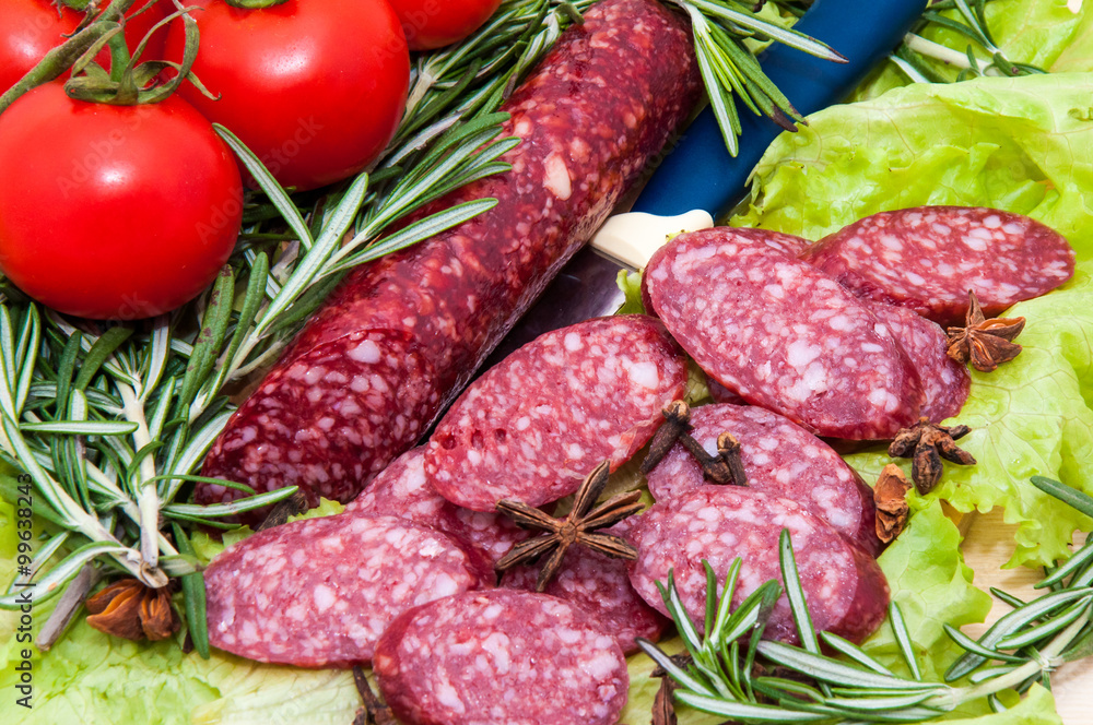 Slice sausage and fresh herbs Slice sausage and fresh herbs