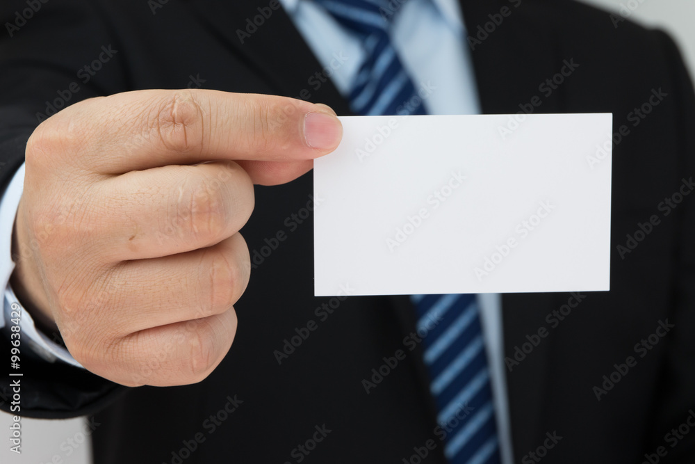 Man hand holding a business card Man hand holding a business card
