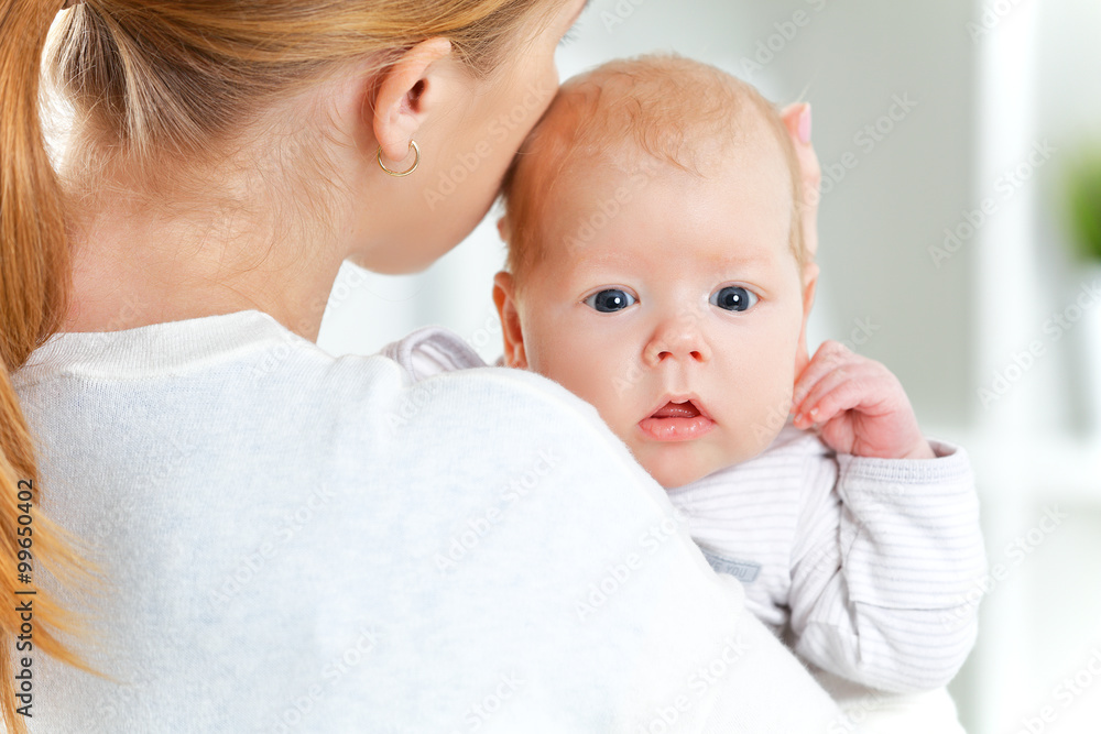 newborn baby in embrace of mother newborn baby in embrace of mother