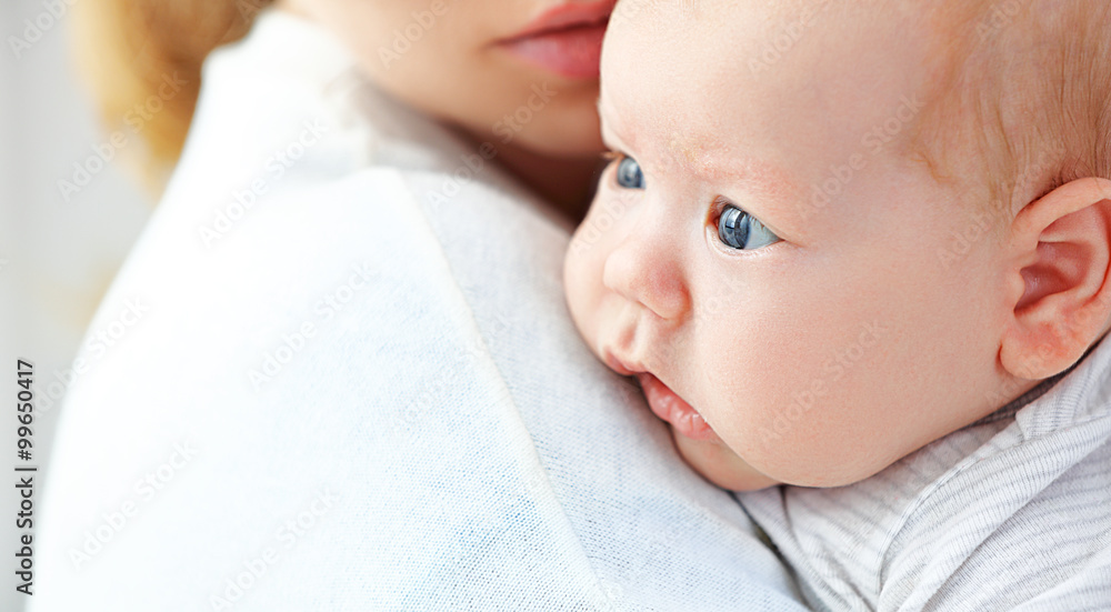 newborn baby in embrace of mother newborn baby in embrace of mother