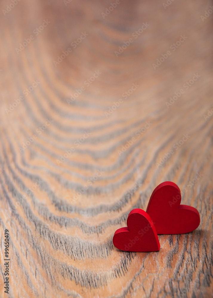 Fototapeta premium Hearts on a wooden background
