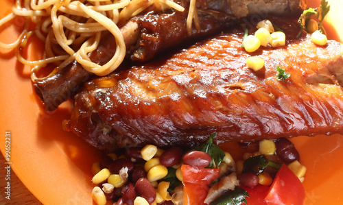 roasted turkey wings with spaghetti and salad photo