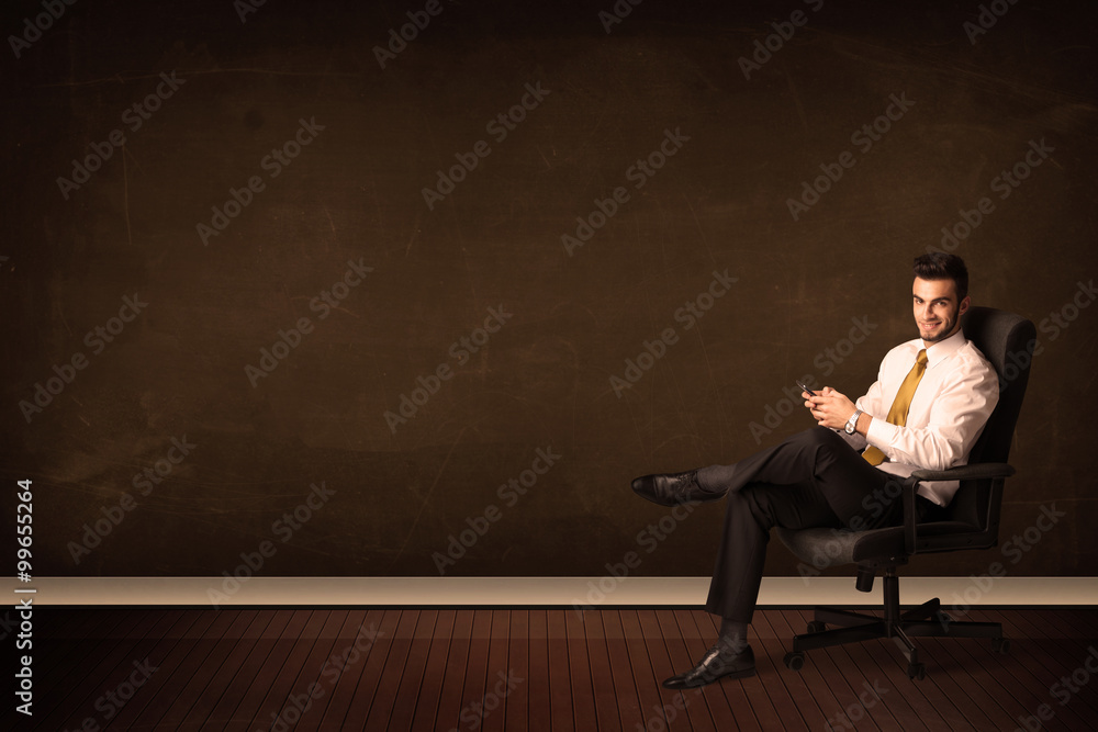 Businessman holding high tech tablet on background with copyspac Businessman holding high tech tablet on background with copyspac