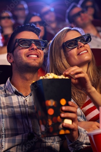 Young couple in 3D movie