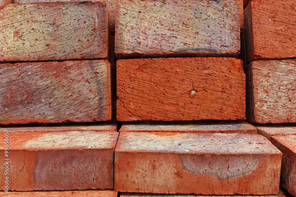 Ground bricks stack closeup Ground bricks stack closeup