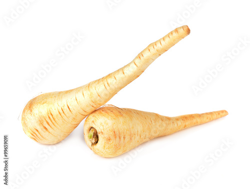 fresh parsnip roots on a white background