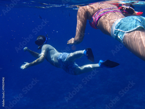 Snorkelers enjoying the warm tropical ocean waters of Maui, Hawaii