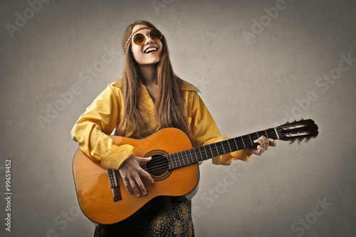 Hippy playing the guitar