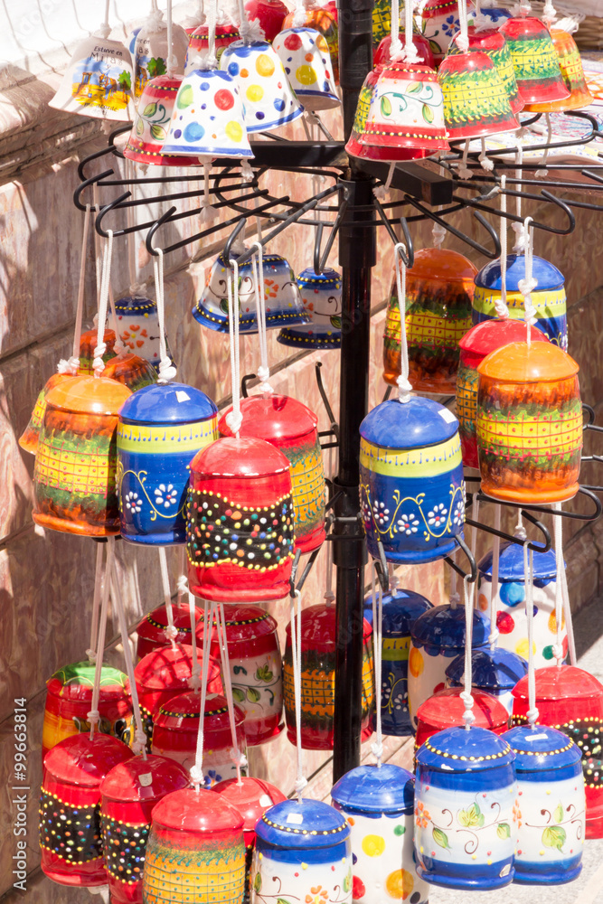 Fototapeta premium Pottery souvenirs hanging outside a shop in Mijas, Andalucia, Spain