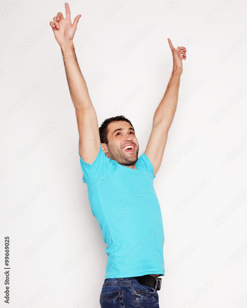 man with both hands raised in the air. man with both hands raised in the air.