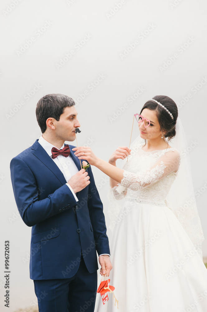 bride and groom attached to face paper mustache , glasses bride and groom attached to face paper mustache , glasses