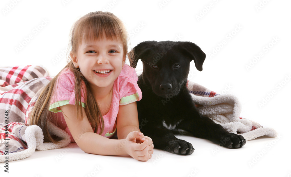 Little cute girl with puppy isolated on white