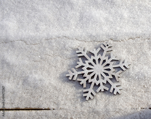 Snowflake in a snow background
