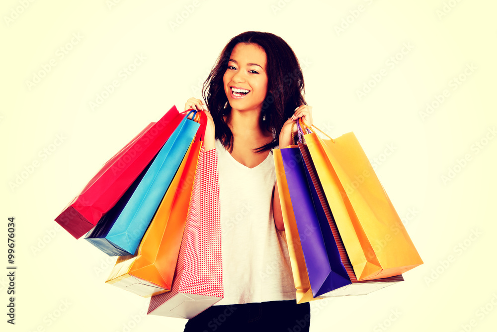 Happy smiling woman with shopping bags.