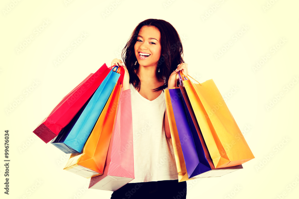 Happy smiling woman with shopping bags. Happy smiling woman with shopping bags.