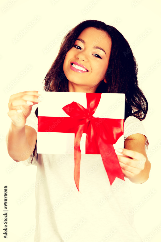 Fototapeta premium Attractive woman with gift box.