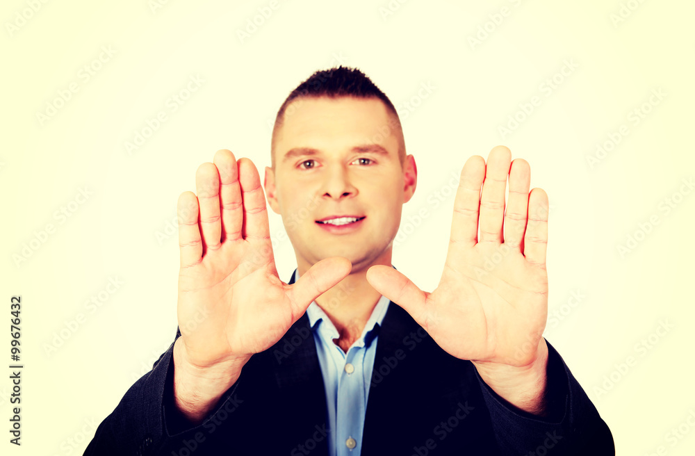 Businessman gesture stop sign with his hands Businessman gesture stop sign with his hands