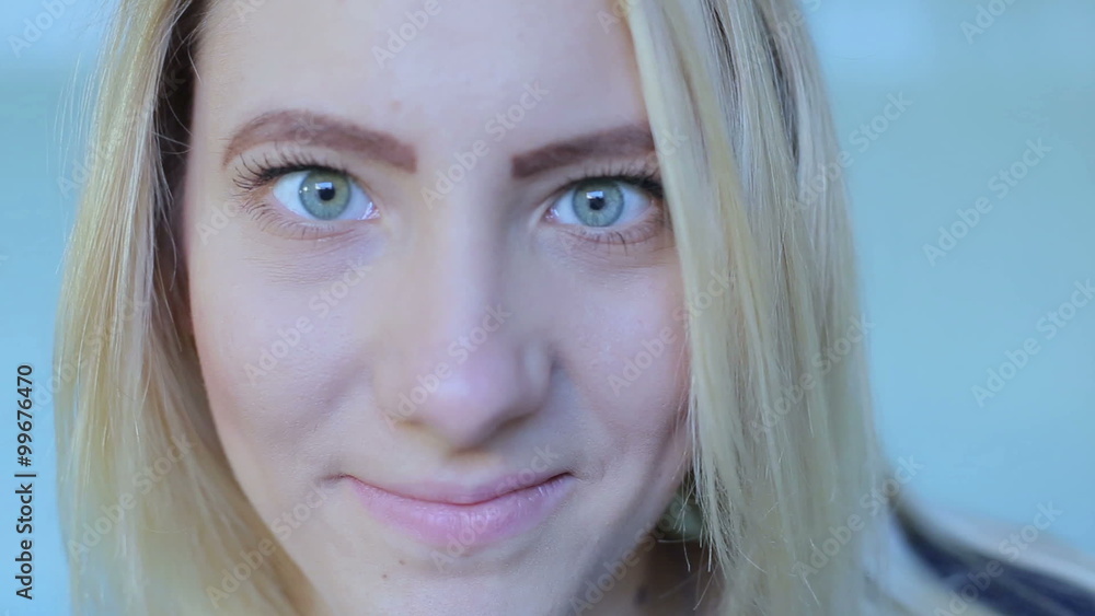 Beautiful girl look at camera clous-up Beautiful girl look at camera clous-up