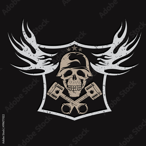 grunge bikers theme emblem with skull,flames and pistons photo