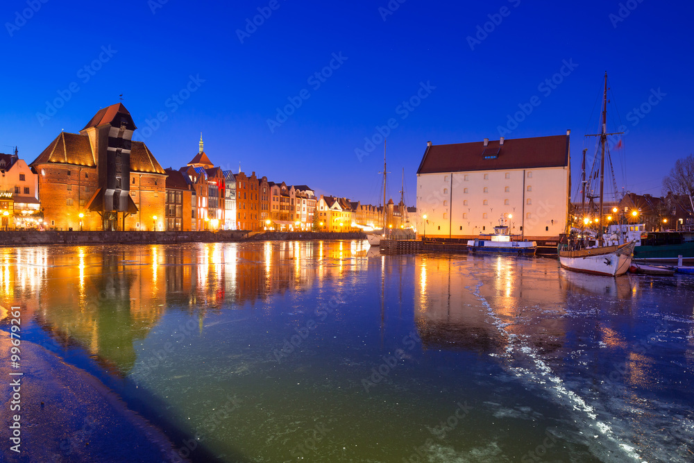 Naklejka premium Old town of Gdansk at frozen Motlawa river, Poland