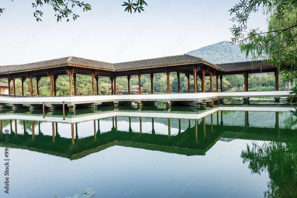 ancient traditional gallery bridge on the west lake in hangzhou,China ancient traditional gallery bridge on the west lake in hangzhou,China