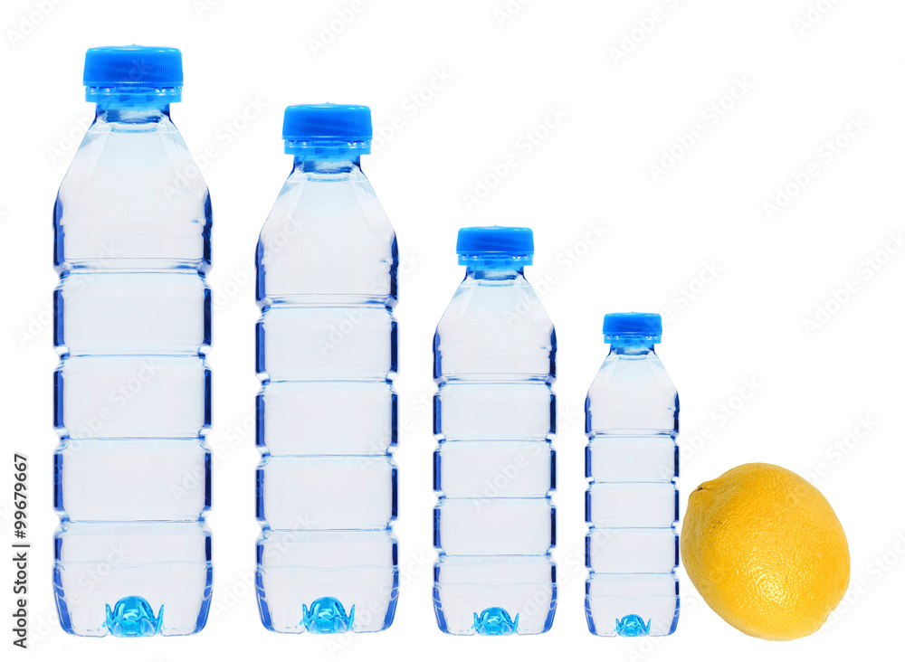 plastic bottles with water and lemon fruit isolated on white plastic bottles with water and lemon fruit isolated on white