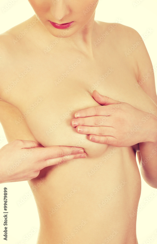 Fototapeta premium Woman examining breast.